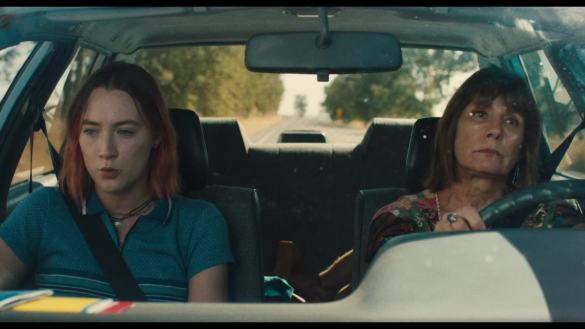 Saoirse Ronan and Laurie Metcalf riding in a car together in the coming-of-age movie LADY BIRD.