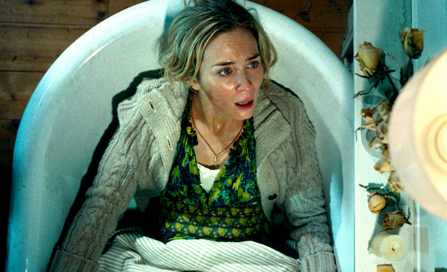 Emily Blunt hiding in a bathtub in A Quiet Place.