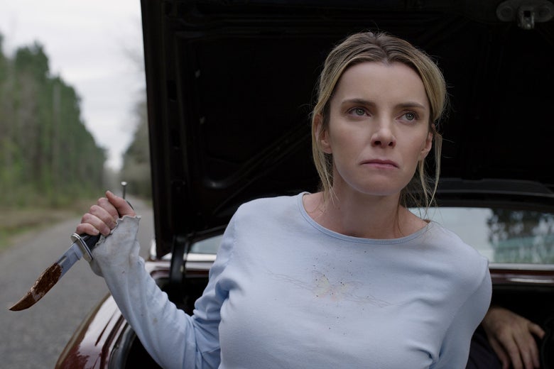 Betty Gilpin holds a knife angrily in the movie The Hunt